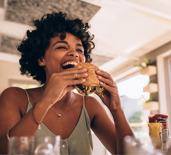 Woman eating a burger