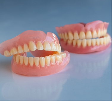Two sets of full dentures