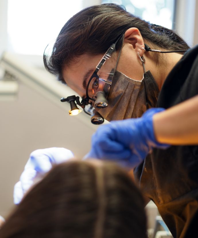 Doylestown dental team member treating a patient