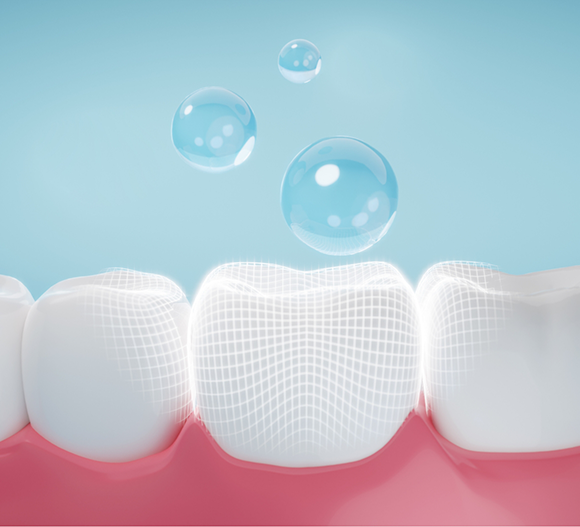 Illustration of a row of teeth and blue bubbles