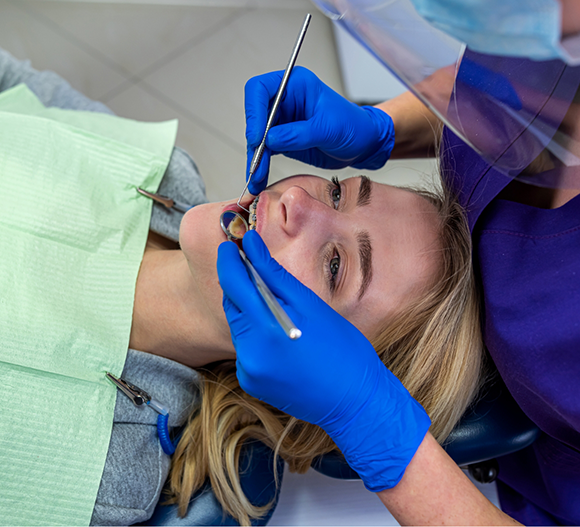 Woman undergoing root canal treatment in Doylestown