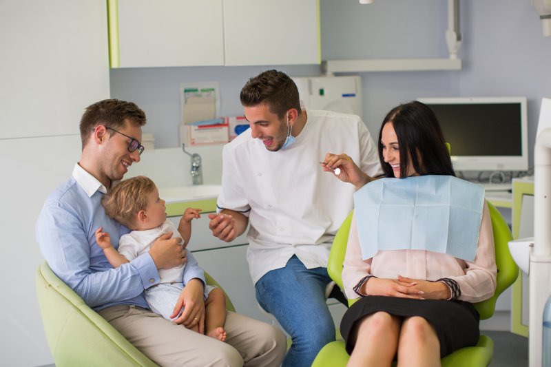 Family visiting dentist together.
