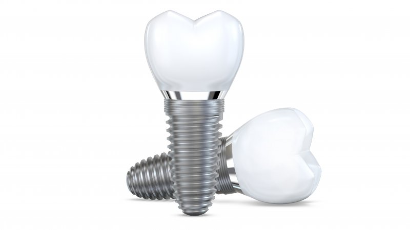 Concept art of two dental implants.