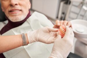 Man with dentures at his checkup
